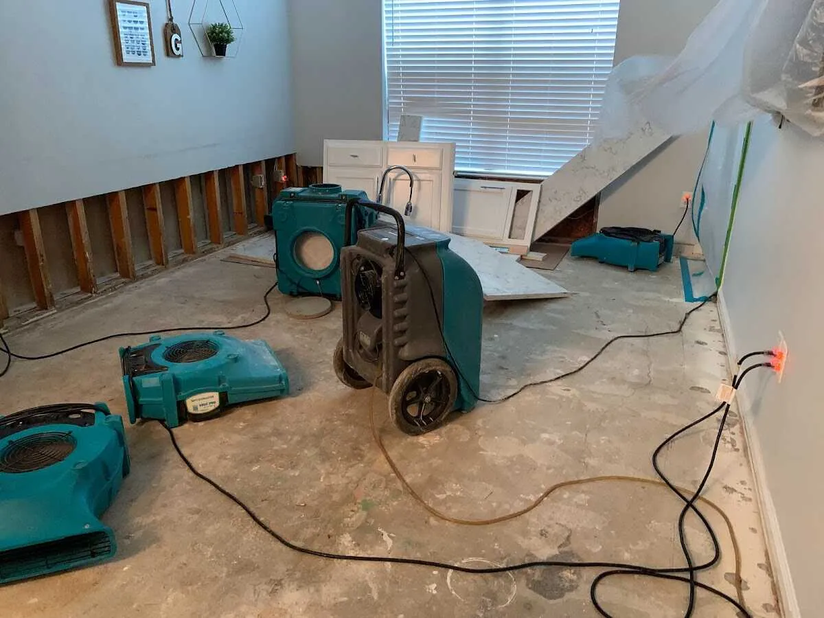 Dehumidifier in flood-cut room for Water Extraction & Removal in White Oak